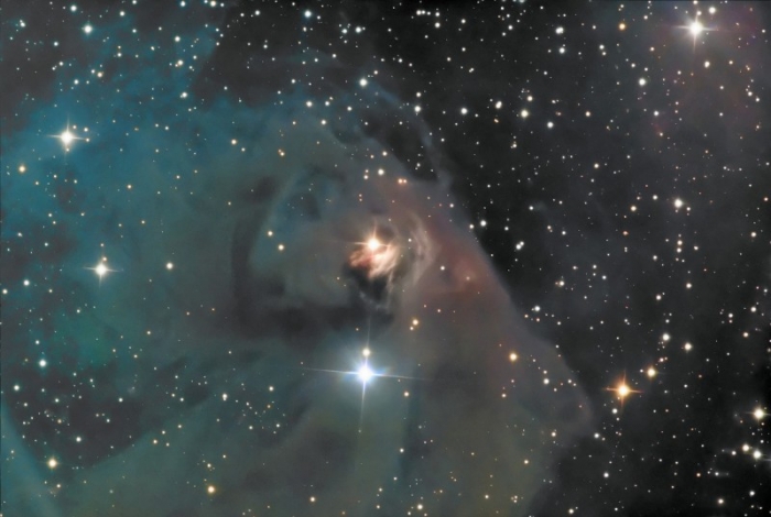 Telescopic image of T Tauri and Hind's Variable Nebula